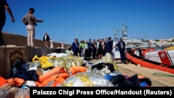 Italian Prime Minister Giorgia Meloni and European Commission President Ursula von der Leyen visit the port where migrants arrive, on the Sicilian island of Lampedusa, Italy, Sept. 17, 2023.