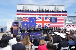 Britain's Prime Minister Rishi Sunak, right, meets with U.S. President Joe Biden and Prime Minister of Australia Anthony Albanese, left, at Point Loma naval base in San Diego, March 13, 2023.