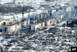 FILE - Video footage of Bakhmut shot from the air with a drone for The Associated Press on Feb. 13, 2023, shows how the longest battle of the yearlong Russian invasion has turned the city of salt and gypsum mines in eastern Ukraine into a ghost town.