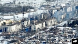 FILE: New video footage of Bakhmut shot from the air with a drone for The Associated Press on Feb. 13, 2023, shows how the longest battle of the yearlong Russian invasion has turned the city of salt and gypsum mines in eastern Ukraine into a ghost town.