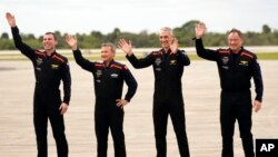 From left, astronauts Marcus Wandt of Sweden, Alper Gezeravci of Turkey, Walter Villadei of Italy and Michael Lopez-Alegria of Spain and the U.S. wave at the Kennedy Space Center, Jan. 18, 2024, in Cape Canaveral, Fla.