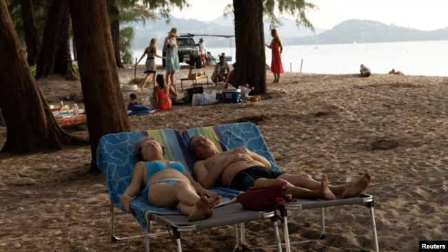 Russian tourists relax in Phuket, Thailand, Dec. 25, 2022.