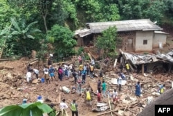 A general scene of destruction caused by a landslide following heavy rains, in the district of Mbankolo, northwest of Yaounde, Oct. 9, 2023.