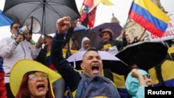 Demonstrators protest against Colombian President Gustavo Petro's reforms in the health, retirement, employment and prison sectors in Bogota, Colombia, April 21, 2024.
