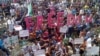 FILE - Aksi unjuk rasa anti-rezim di kota Habit, provinsi Idlib yang bergolak, 11 Mei 2012. (Shaam News Network/AFP). Penyidik ​​​​di Jerman dan Swedia menangkap delapan tersangka kejahatan terhadap kemanusiaan di Suriah, 3 Juli 2024.
