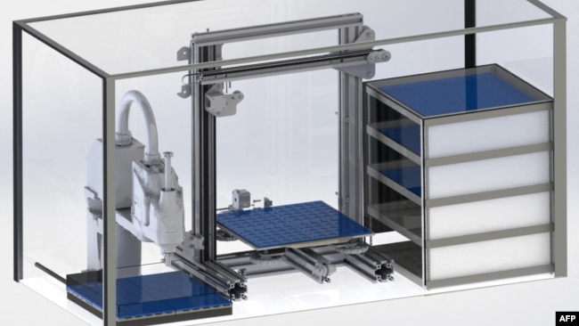 This handout image released by Massachusetts Institute of Technology (MIT) on April 24, 2023, shows a "vaccine printer" at Cambridge, Massachusetts. (Photo by JOOI HAN/MIT/AFP)