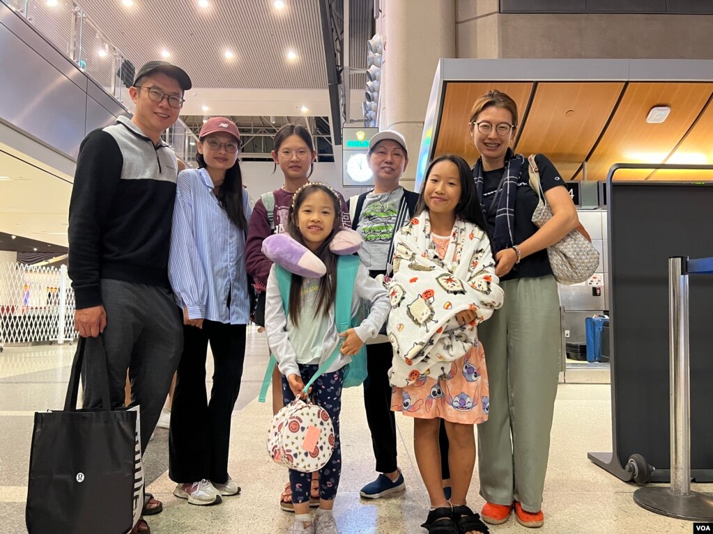 来自澳门的薇薇安（Vivian Huang）一家人（三个女儿、妈妈、弟弟和弟媳）(photo:VOA)