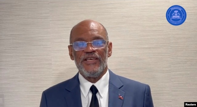 Haiti's Prime Minister Ariel Henry speaks while addressing the nation, at an unidentified location on a date given as March 11, 2024, in this screengrab obtained from a handout video. (Prime Minister of the Republic of Haiti via X/Handout via REUTERS)