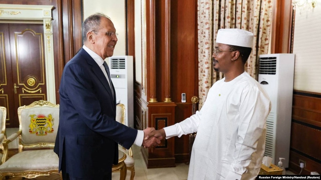 Russia's Foreign Minister Sergei Lavrov shakes hands with Chad's President Mahamat Idriss Deby during a meeting in N'djamena, Chad, June 5, 2024. 