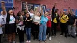FILE - Students of the Thomazia Montoro public school shout for peace and against violence during a vigil at their school in Sao Paulo, Brazil, March 28, 2023. (AP Photo/Andre Penner, File)