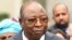 Niger Prime Minister Ouhoumoudou Mahamadou speaks with the press outside Niger's embassy, in Paris on Aug. 5, 2023.