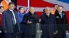Presiden Rusia Vladimir Putin dalam konferensi pers bersama ketiga rivalnya dalam pilpres Rusia, di Lapangan Merah, Moskow, Senin (18/3). 