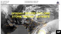 Satellite image from India Meteorological Department shows storm Mocha intensify into a severe cyclonic storm. Bangladesh and Myanmar evacuating thousands of people, May 12, 2023.