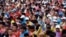 Participants wait before the Beijing Marathon, at Tiananmen Square in Beijing, Oct. 29, 2023. 