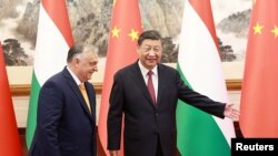 FILE - Chinese President Xi Jinping meets Hungary's Prime Minister Viktor Orban at the Diaoyutai State Guesthouse in Beijing, China July 8, 2024.