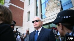 Former BBC news anchor Huw Edwards leaves after a hearing at Westminster Magistrates' Court in London on July 31, 2024. 