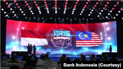 Bank Indonesia (BI) dan Bank Negara Malaysia (BNM) meresmikan implementasi interkoneksi pembayaran antara Indonesia dengan Malaysia menggunakan QR Code. (Foto: Courtesy/Situs Web Bank Indonesia)