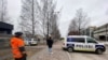 A police cordon stands outside Viertola school in Vantaa, after a shooting took place there earlier in the day, in a suburb of the capital Helsinki, Finland April 2, 2024. 
