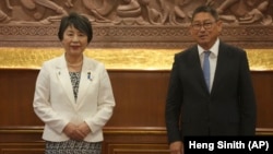 Japanese Foreign Minister Yoko Kamikawa, left, with her Cambodia counterpart Sok Chenda Sophea, right, during a meeting in Phnom Penh, Cambodia, July 6, 2024.