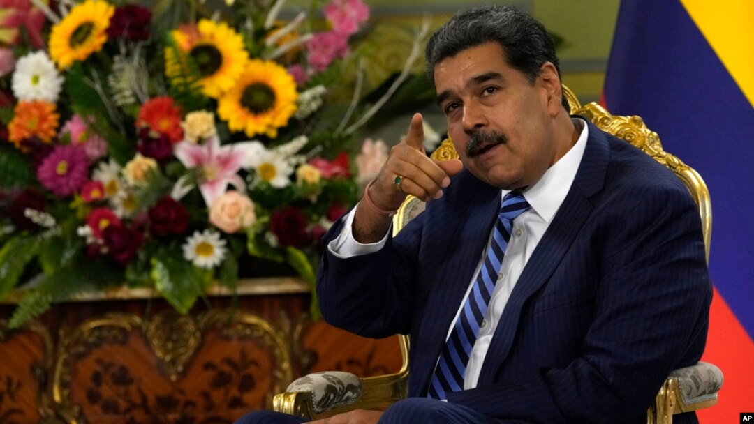 Venezuela's President Nicolas Maduro points while meeting Colombia's new ambassador to Venezuela, at the Miraflores Presidential Palace in Caracas, Venezuela, Aug. 16, 2023. 