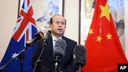 FILE - China's Ambassador to Australia Xiao Qian speaks to media at the Embassy of China in Canberra, May 18, 2023. Xiao asked Australian authorities to increase efforts to find survivors from a capsized Chinese fishing boat in the Indian Ocean.