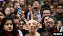 A Harry Potter fan dressed as Dobby attends Back to Hogwarts Day at Kings Cross Station in London, Britain.