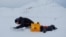 Paul Scherrer Institute Switzerland chemist Francois Burgay, 34, prepares to take a snow sample to detect molecules connected to algal bloom in Ny-Aalesund, Svalbard, Norway, April 5, 2023.