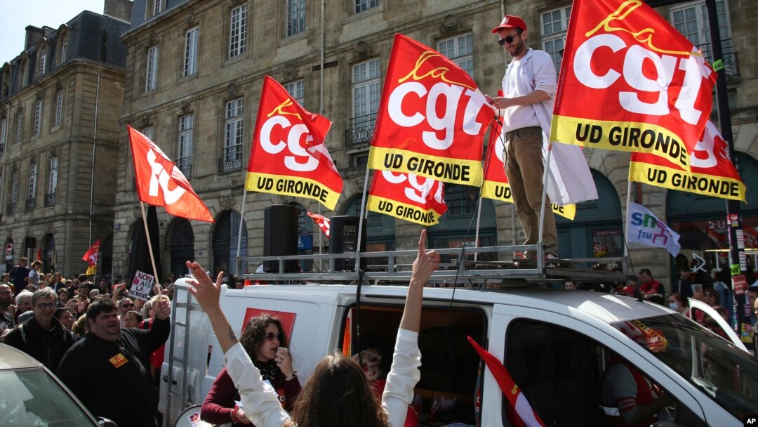 CGT union members demonstrate against French President Emmanuel Macron's push to raise France's retirement age from 62 to 64, at a march in Bordeaux, southwestern France, March 28, 2023.