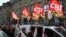 CGT union members demonstrate against French President Emmanuel Macron's push to raise France's retirement age from 62 to 64, at a march in Bordeaux, southwestern France, March 28, 2023.