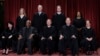 FILE - U.S. Supreme Court justices, bottom row, from left, Sonia Sotomayor, Clarence Thomas, Chief Justice John Roberts, Samuel Alito, and Elena Kagan. Top row, from left, Amy Coney Barrett, Neil Gorsuch, Brett Kavanaugh, and Ketanji Brown Jackson, Oct. 7, 2022. 