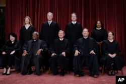 Supreme Court justices, Bottom row, from left, Sonia Sotomayor, Clarence Thomas, Chief Justice John Roberts, Samuel Alito, and Elena Kagan. Top row, from left, Amy Coney Barrett, Neil Gorsuch, Brett Kavanaugh, and Ketanji Brown Jackson, Oct. 7, 2022.