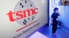 FILE - The logo of TSMC (Taiwan Semiconductor Manufacturing Company) is shown during the Taiwan Innotech Expo at the World Trade Center in Taipei, Taiwan, Oct. 14, 2022. 