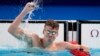 Leon Marchand of France celebrates after winning the men's 200-meter breaststroke final at the 2024 Summer Olympics, July 31, 2024, in Nanterre, France.