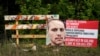 A posted wanted sign for a mass shooting suspect is shown, May 2, 2023, in the neighborhood where the shooting occurred Friday, in Cleveland, Texas. 