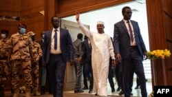 FILE - Chad transitional president General Mahamat Idriss Deby greets supporters as he arrives at the Chadian Ministry of Foreign Affairs in N'Djamena, on March 2, 2024.