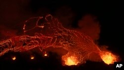 Lava flows from the volcano near the town of Grindavik, Iceland.