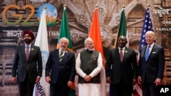 From left, World Bank President Ajay Banga, Brazilian President Luiz Inacio Lula da Silva, Indian Prime Minister Narendra Modi, South African President Cyril Ramaphosa and U.S. President Joe Biden pose for a group photo during the G20 Summit in New Delhi on Sept. 9, 2023.