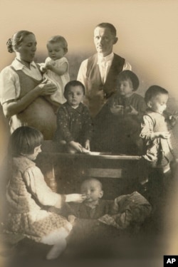 This undated photo shows Polish farmer Jozef Ulma with his pregnant wife, Wiktoria, and their six children.
