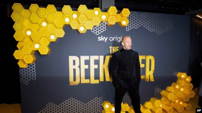 FILE - Jason Statham poses for photographers upon arrival at the UK premiere of the film 'The Beekeeper' on Jan. 10, 2024 in London. (Scott A Garfitt/Invision/AP)