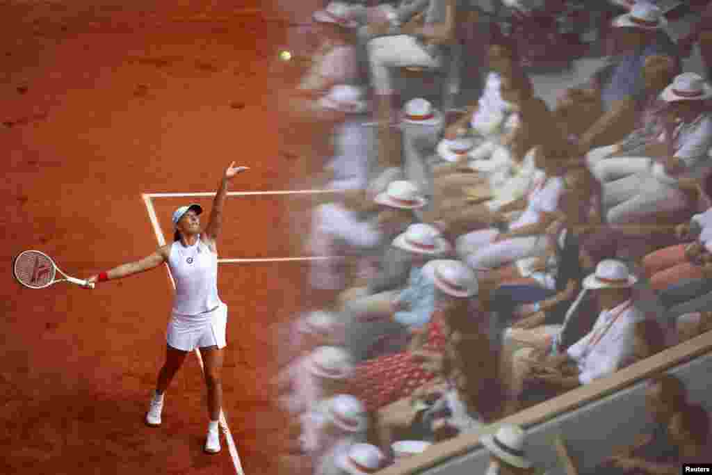 Poland's Iga Swiatek is pictured serving to Czech Republic's Karolina Muchova during the final match of the French Open in Roland Garros, Paris, France, June 10, 2023.