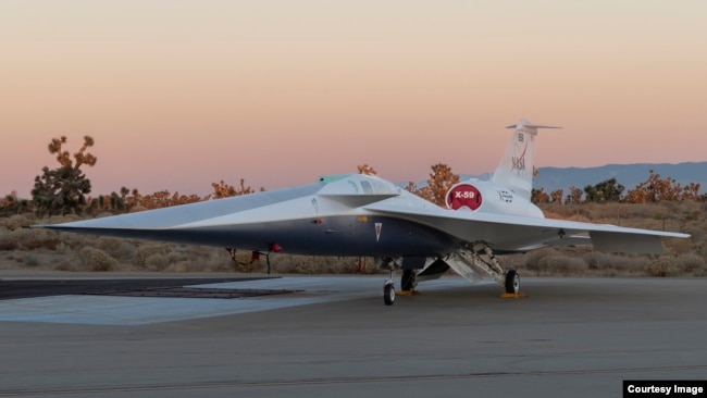 NASA’s X-59 supersonic research aircraft sits outside Lockheed Martin’s Skunk Works facility in Palmdale, California. (Image Credit: NASA Lockheed Martin Skunk Works)
