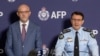 A supplied image shows ASIO Director-General Mike Burgess and AFP Commissioner Reece Kershaw addressing the media in Canberra, Australia, July 12, 2024. 