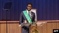 Bassirou Diomaye Faye gives his address as Senegal's President at an exhibition centre in the new town of Diamniadio near the capital Dakar, Apr. 2, 2024. 