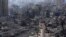 FILE - Destruction from Israeli aerial bombardment is seen in Gaza City, on Oct. 11, 2023.