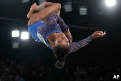 Simone Biles of the United States performs on the floor during the women's artistic gymnastics all-around finals in Bercy Arena at the 2024 Summer Olympics in Paris, Aug. 1, 2024.