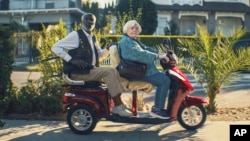 This image released by Magnolia Pictures shows Richard Roundtree, left, and June Squibb in a scene from the film "Thelma." (Magnolia Pictures via AP)