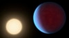 This illustration provided by NASA in 2017 depicts the planet 55 Cancri e, right, orbiting its star. 