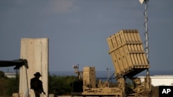 FILE - A battery of Israel's Iron Dome defense missile system, deployed to intercept rockets, sits in Ashkelon, southern Israel, Aug. 7, 2022.