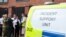 Metropolitan Police Assistant Commissioner Louisa Rolfe stands with colleagues from the Fire and Ambulance service before a joint press conference near the scene of a crime in Hainault, east of London on April 30, 2024.