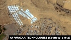 This handout satellite image courtesy of Maxar Technologies shows tent camps for displaced Palestinians in Rafah in the southern Gaza Strip on April 23, 2024, amid the ongoing conflict between Israel and the militant Hamas group.